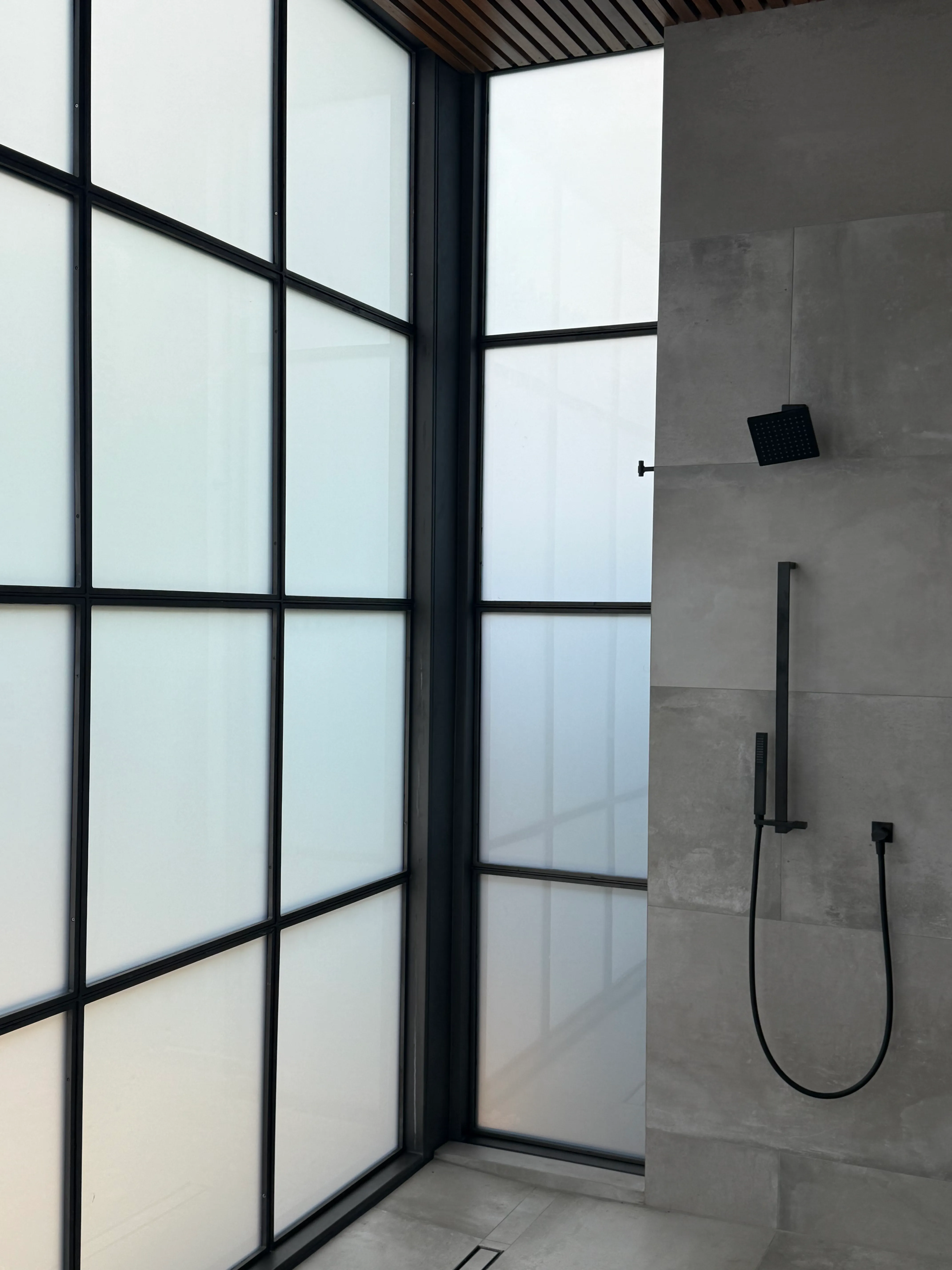 The same corner shower glass switched to frosted for privacy